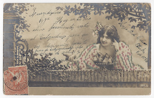 A woman with flowers in her hair and a bowl of fruit; sepia and colored glitter; handwritten text; one stamp.