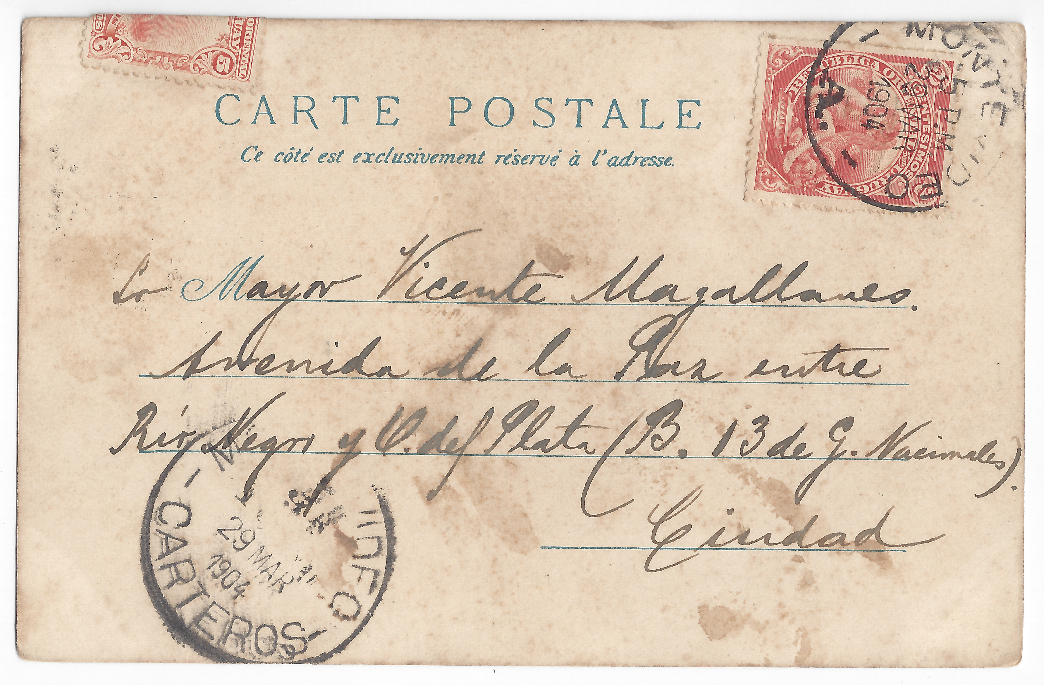 Handwritten text: recipient and address; one stamp and part of another stamp. 